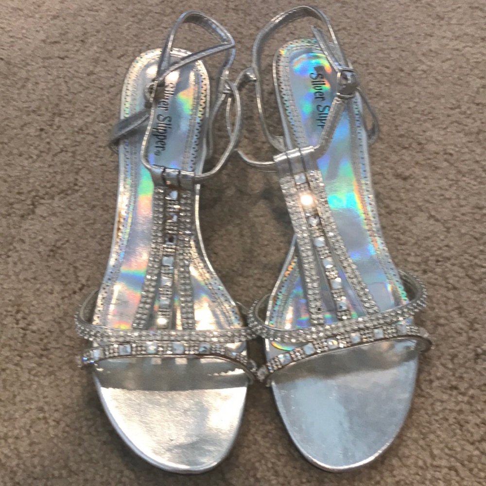 Silver jeweled heels.